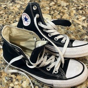High top Converse All Star. Black with white sole. Gently used.
